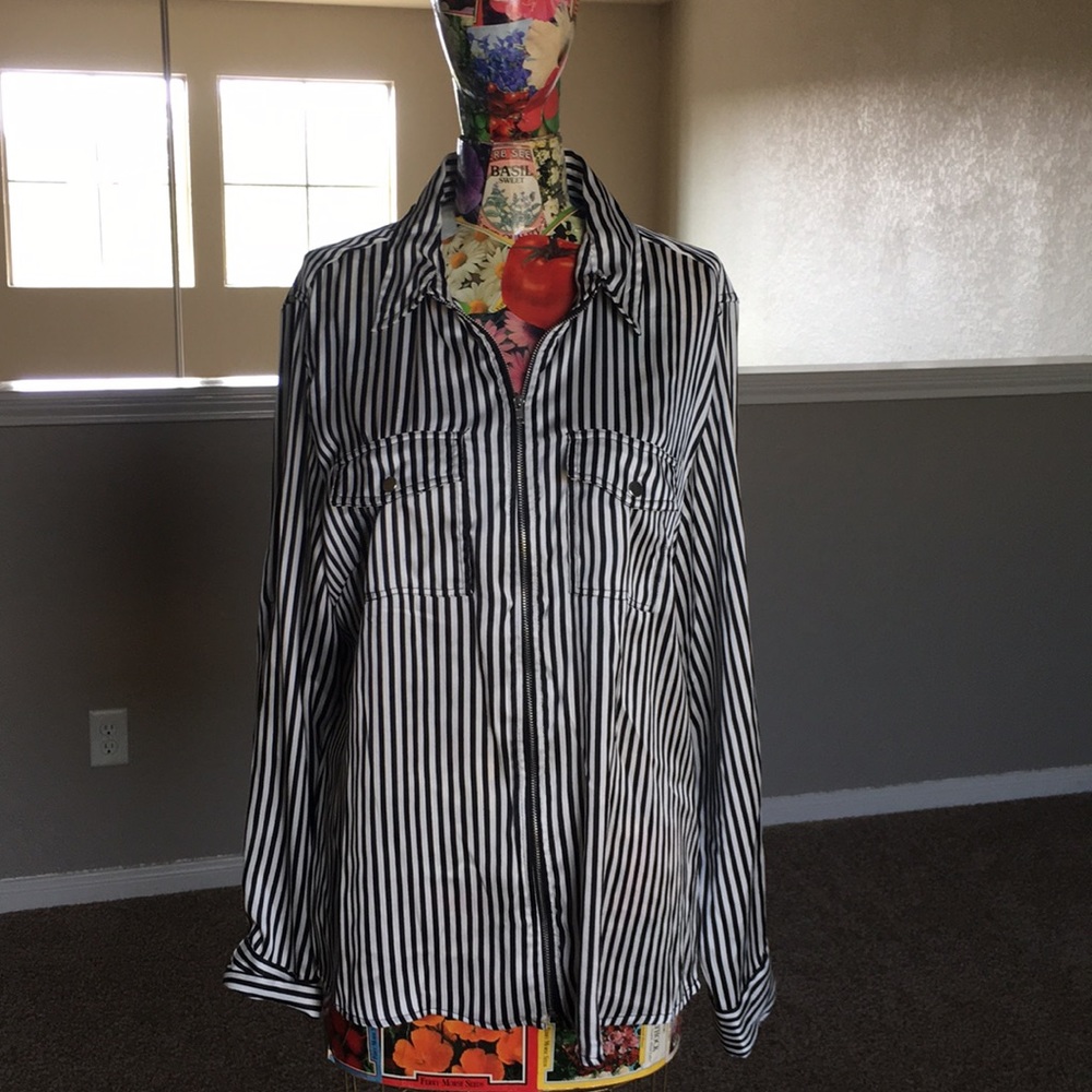 Black and white striped zip up top